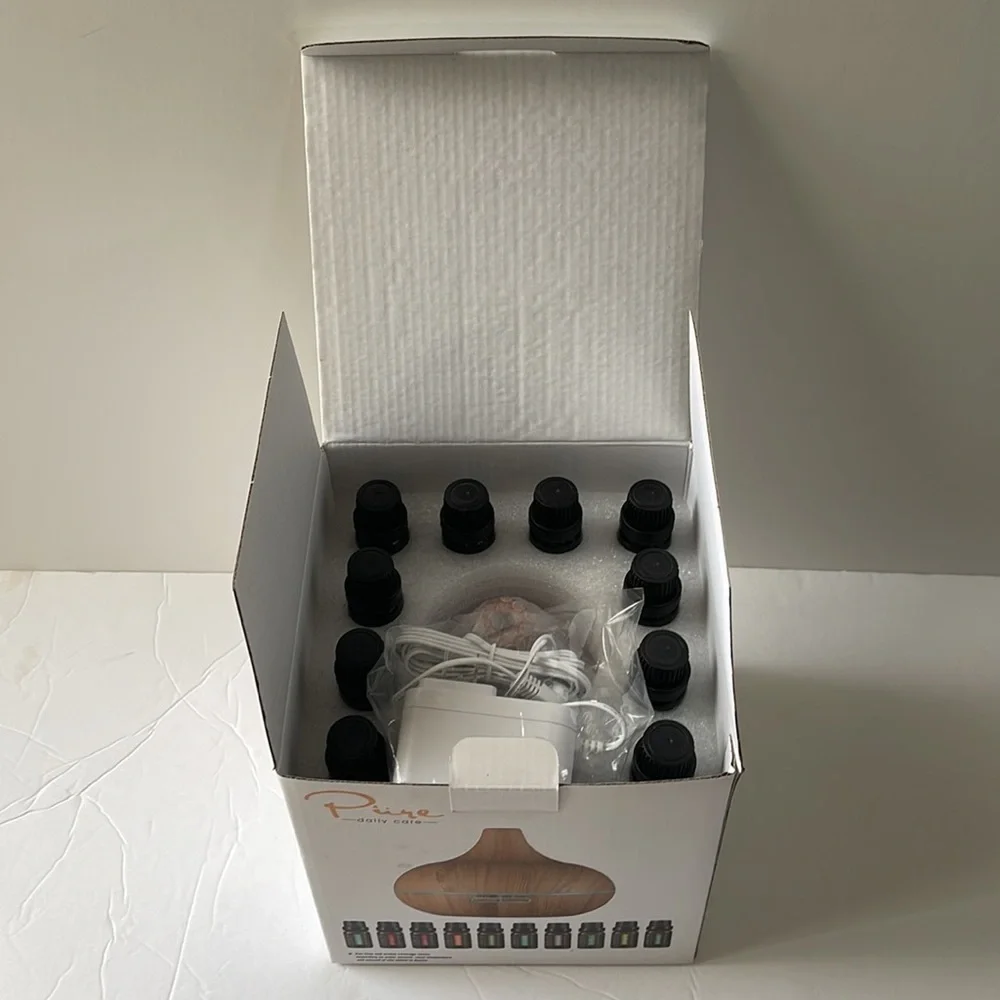 NIB Pure Daily Care Ultrasonic Aromatherapy Diffuser with 10 Pure Essential Oils